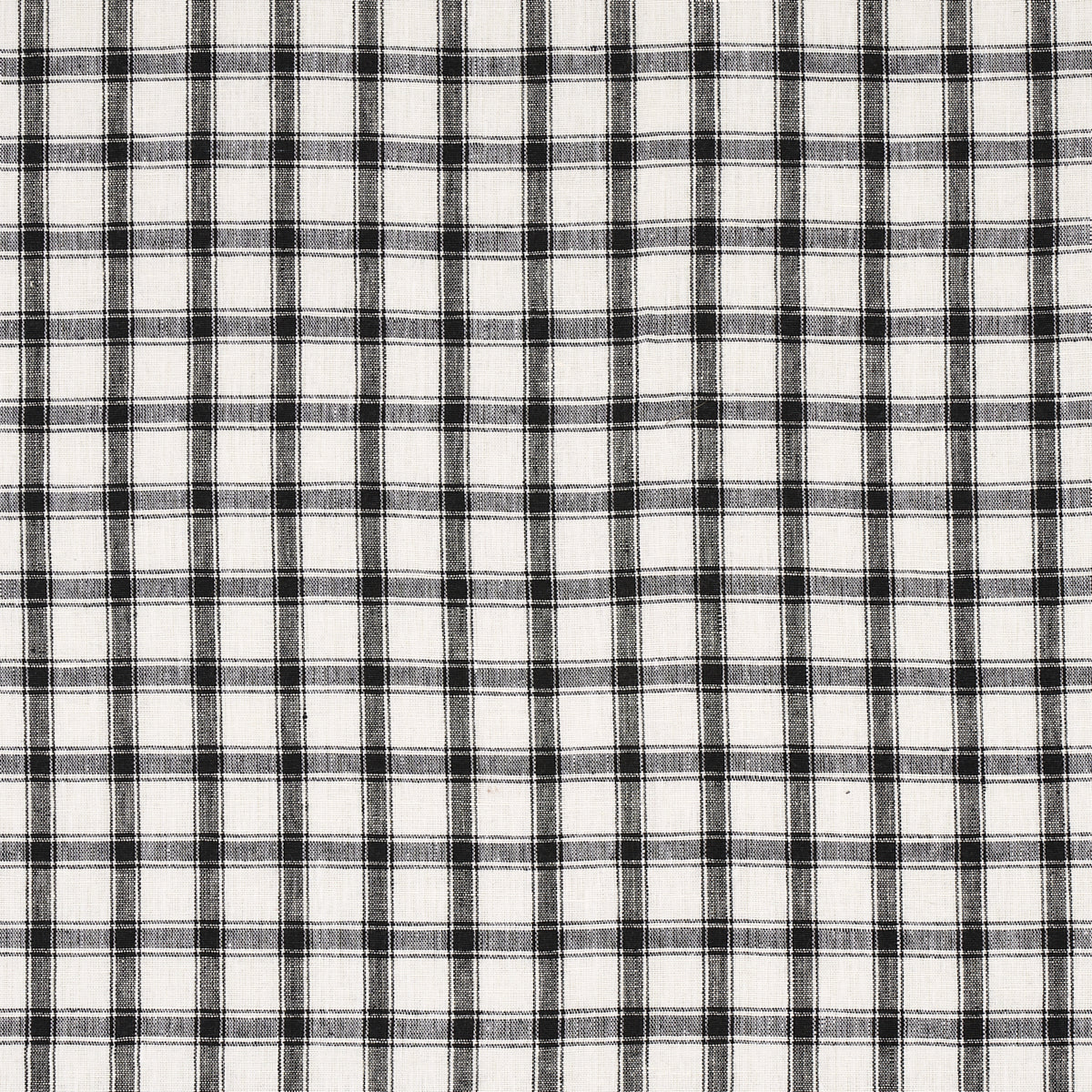 White fabric with a black grid plaid pattern, woven texture.