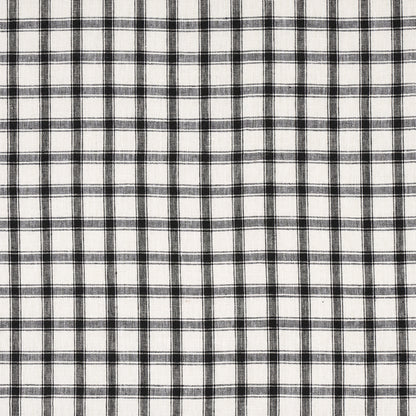 White fabric with a black grid plaid pattern, woven texture.