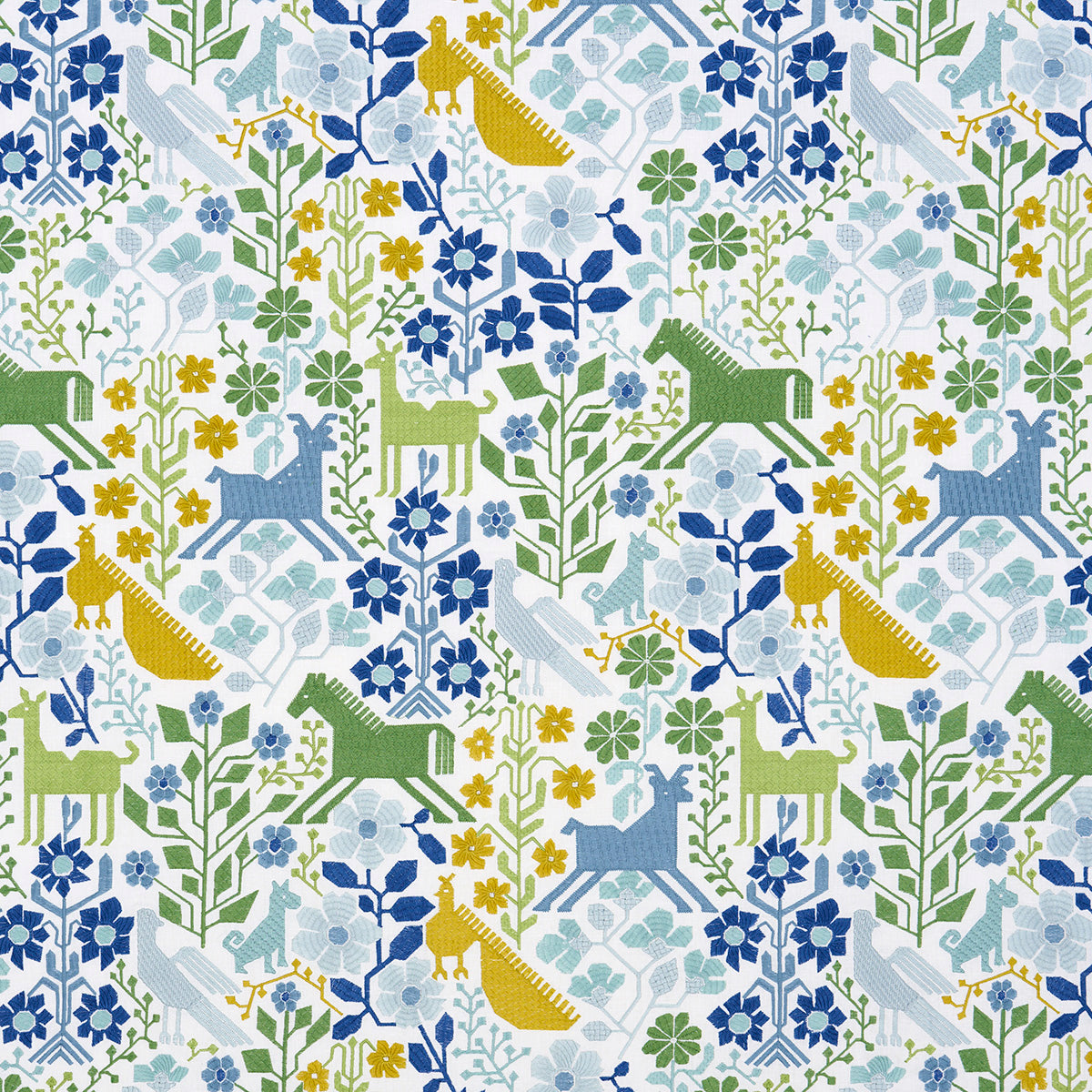 Green & blue embroidered fabric with intricate patterns.