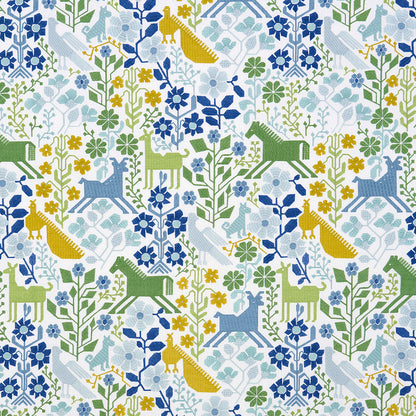 Green & blue embroidered fabric with intricate patterns.