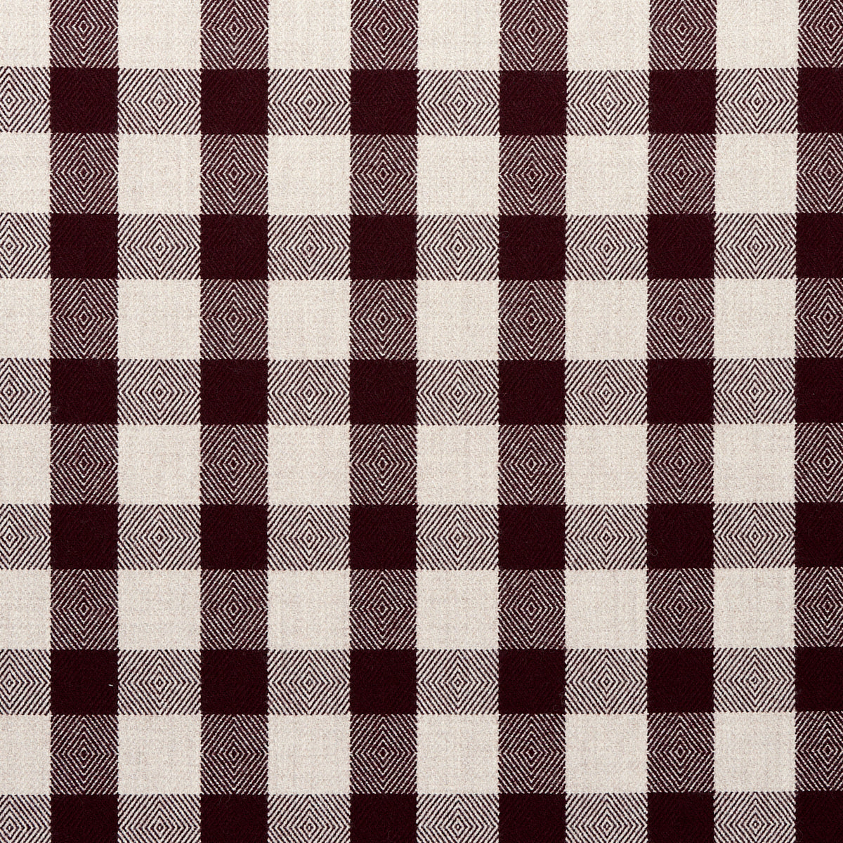 Maroon and cream buffalo check woven fabric with textured grid plaid; rustic textile for shirts or table linens.