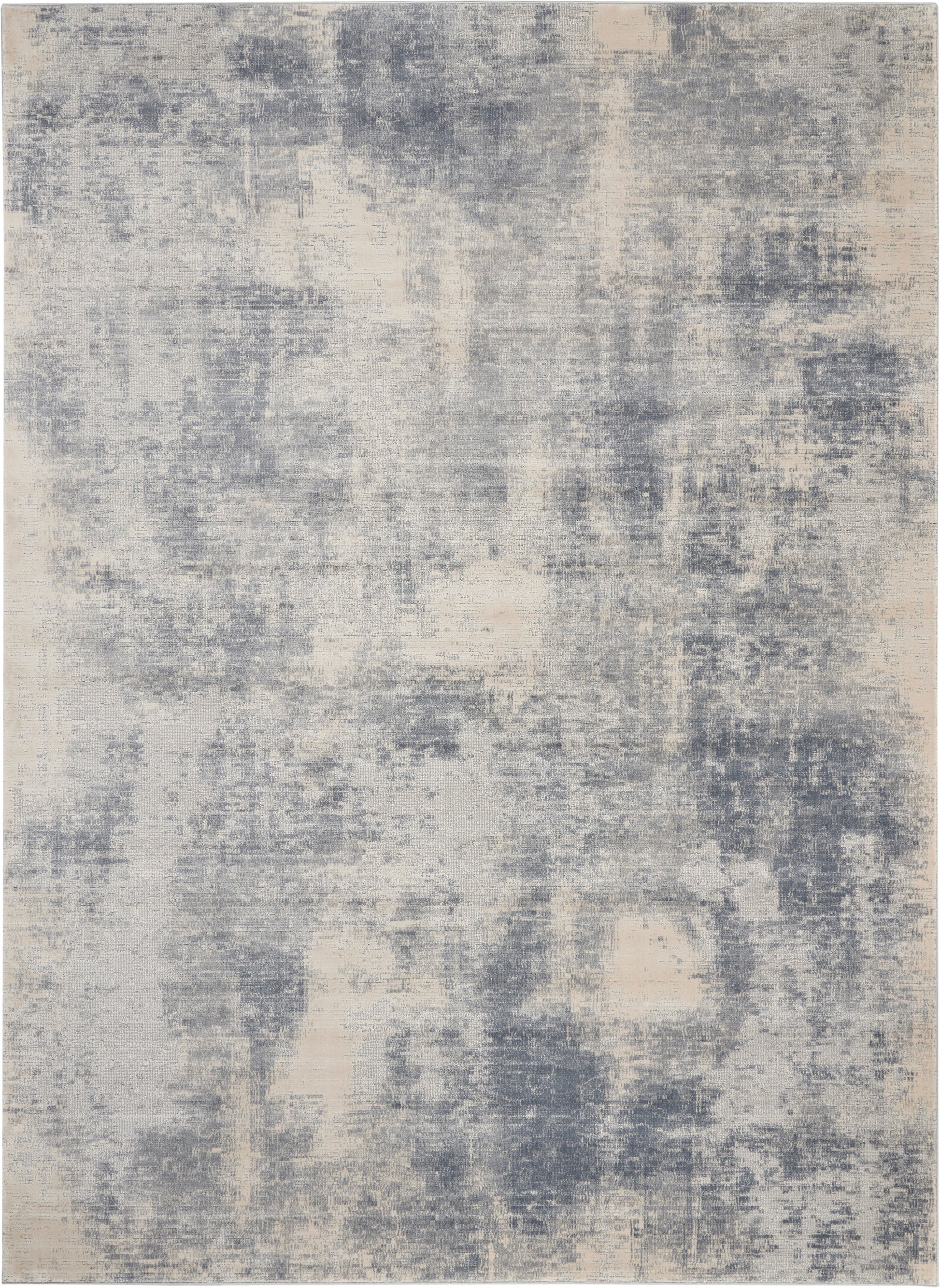 Rectangular rug with blue-gray & cream abstract distressed pattern, modern & versatile for living spaces.