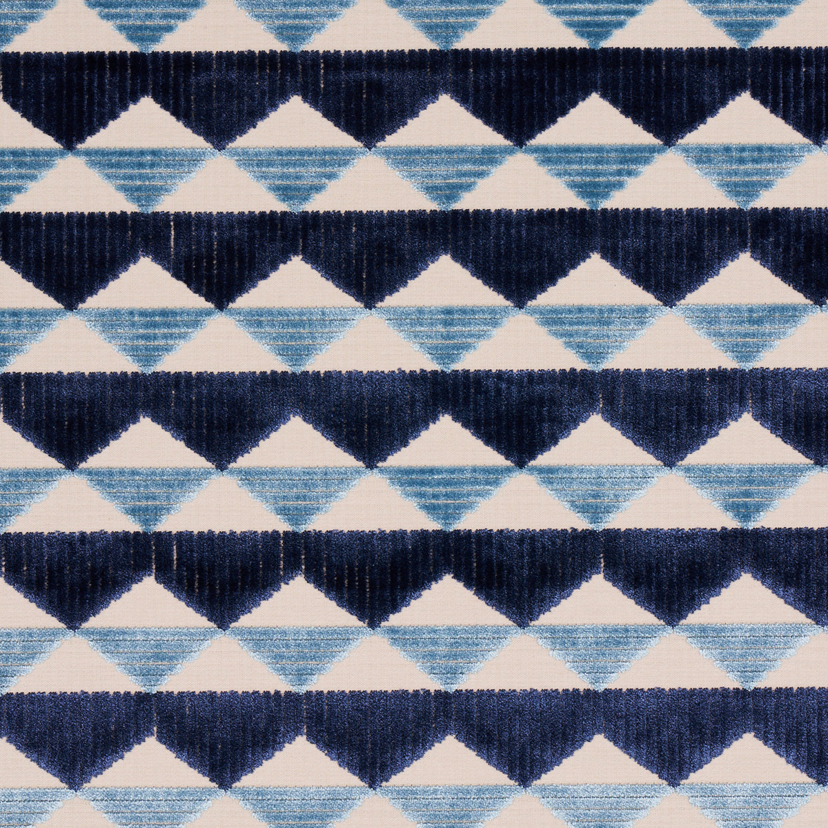 Navy & light blue geometric triangle chevron fabric pattern; woven textile with repeating diamond shapes.