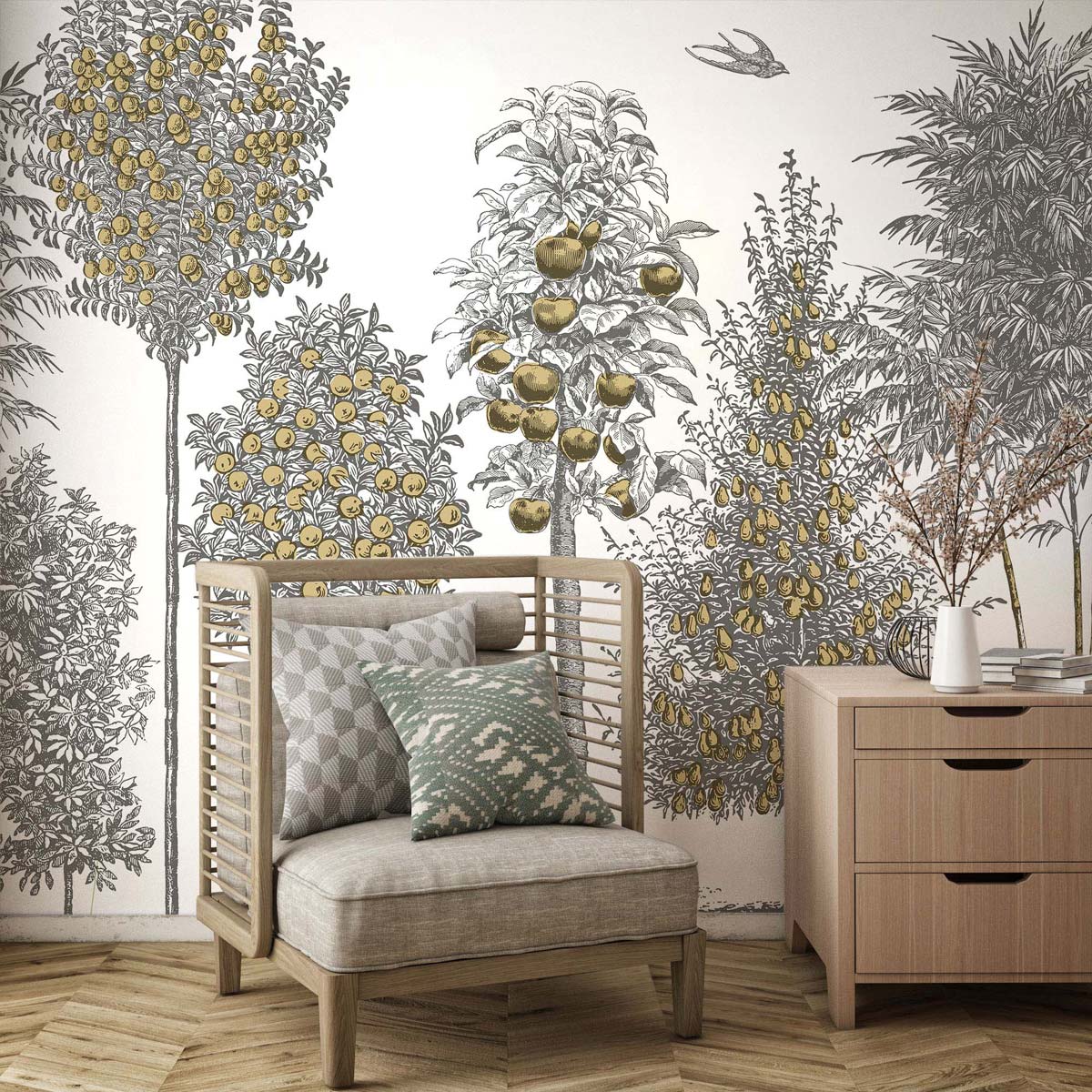 Living room with gray-yellow lemon-tree mural, beige cushioned wooden armchair with green/gray pillows, and a light wood dresser.