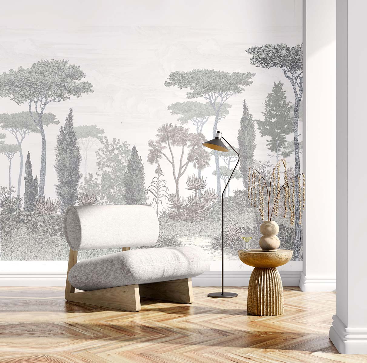 Beige lounge chair with wooden legs, black floor lamp and stacked wood side table in front of a gray forest wall mural.