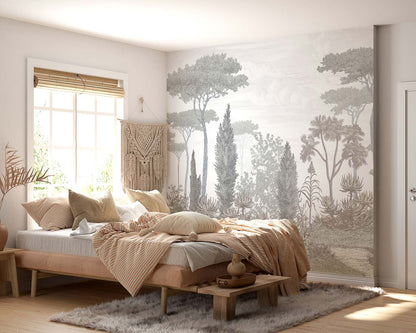 Boho bedroom with a wooden platform bed, neutral linens and beige throw, nature mural wall, and macramé wall hanging.
