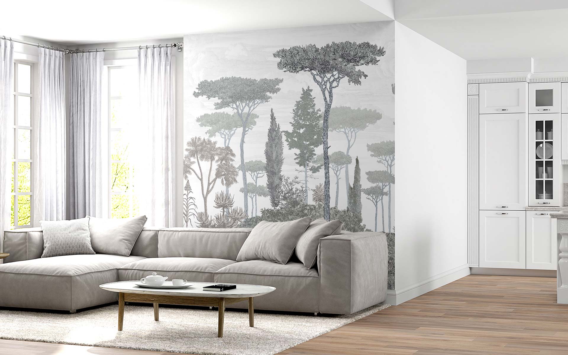 Modern living room with a light gray sectional sofa, oval wooden coffee table, tree mural wall, and white cabinetry.