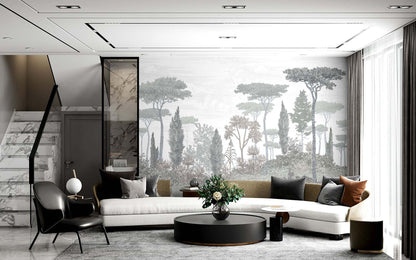 Modern living room with white sectional, round black coffee table, black accent chairs, and a grayscale forest mural.