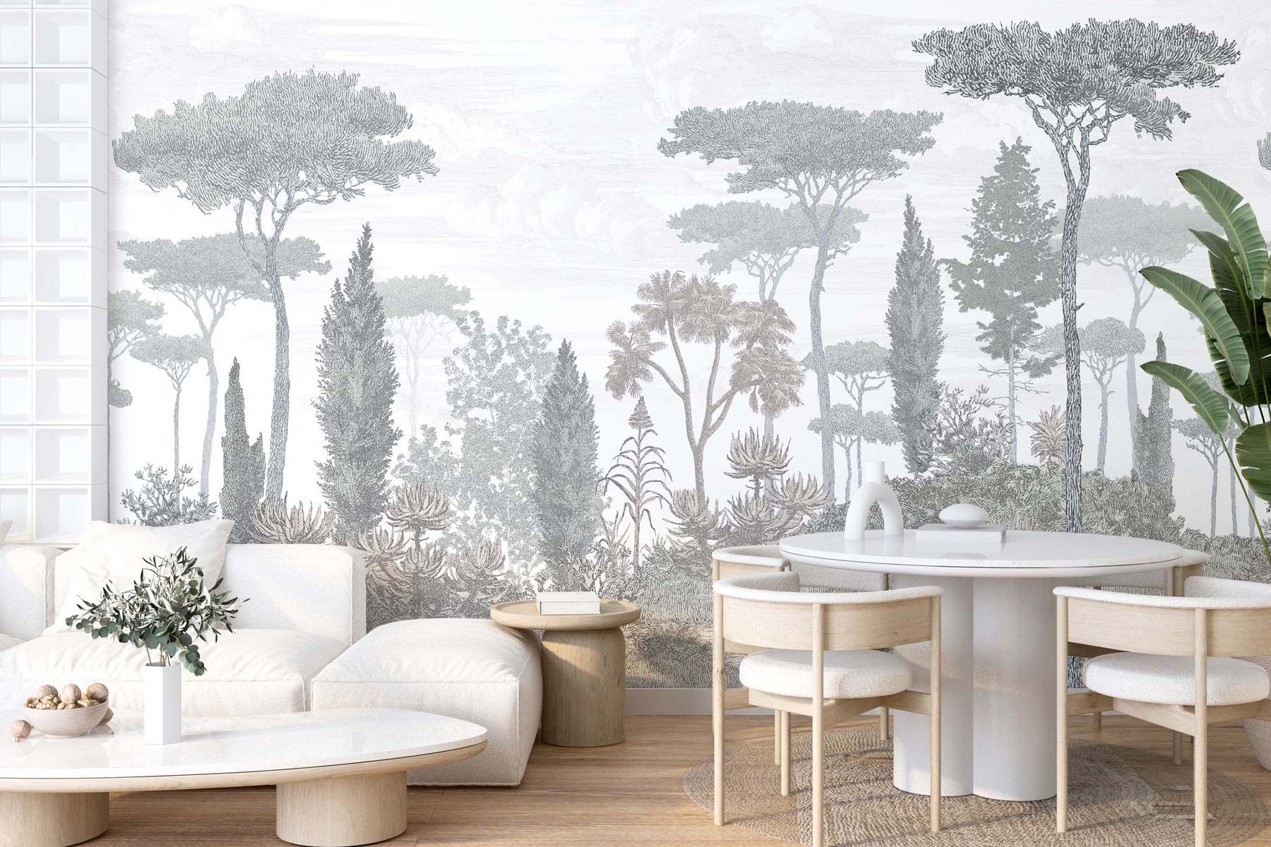 Bright living area with a grey forest wall mural, a white round dining table, light wood chairs, and a white sofa.