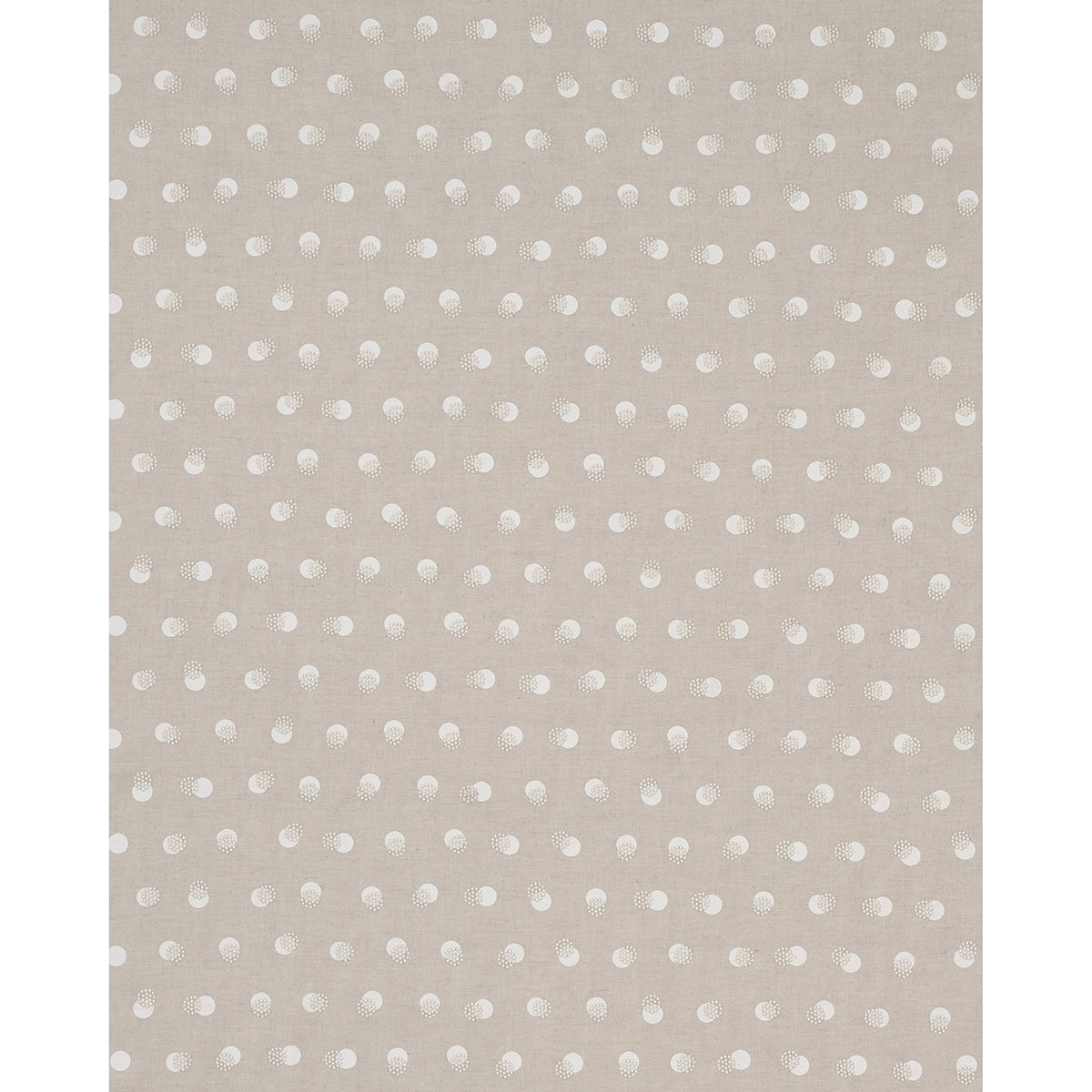 Beige area rug with evenly spaced white polka dots in a repeating pattern; soft, modern casual decor.