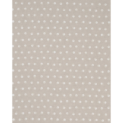 Beige area rug with evenly spaced white polka dots in a repeating pattern; soft, modern casual decor.