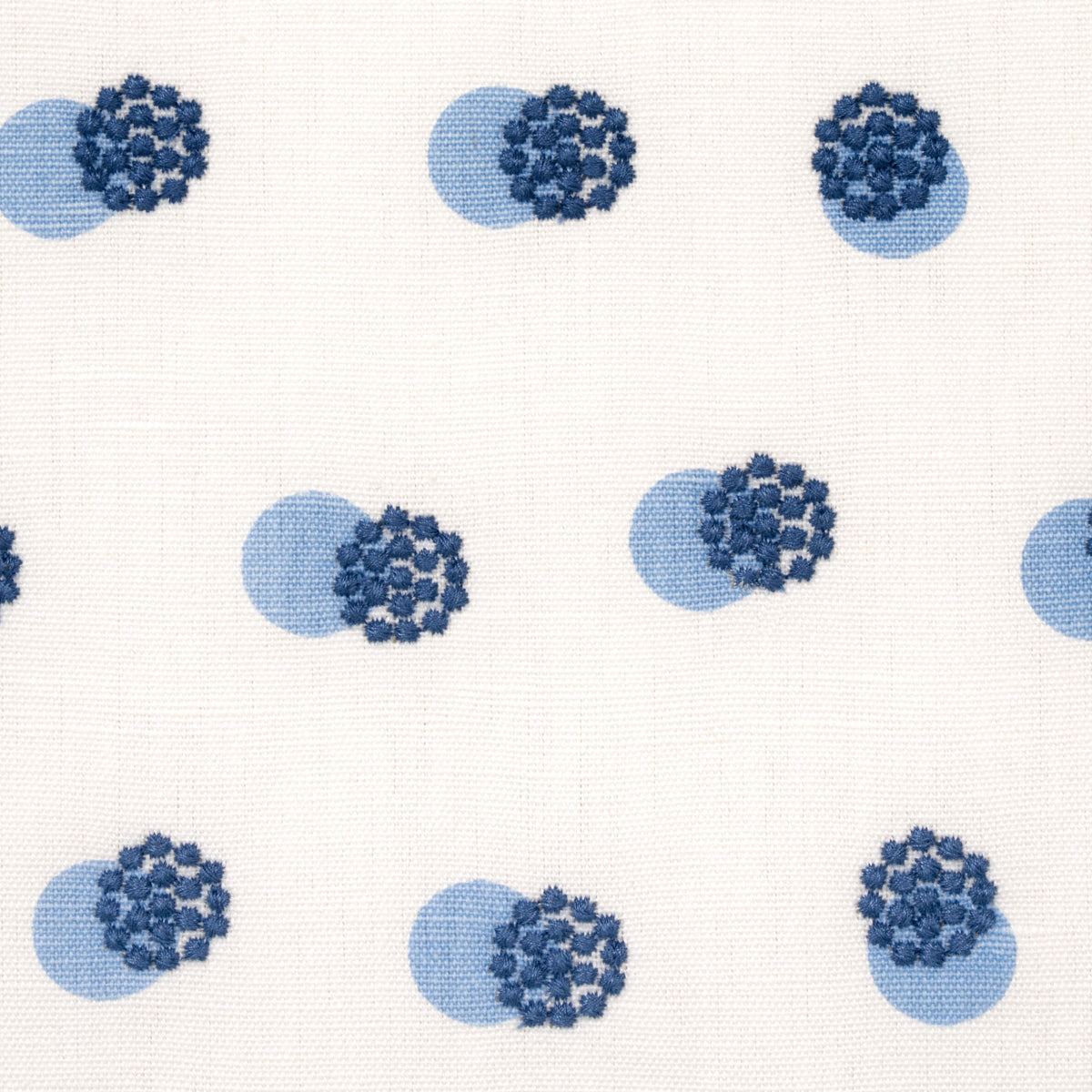 Cream fabric with repeating navy blueberry clusters and soft blue circle shadows.