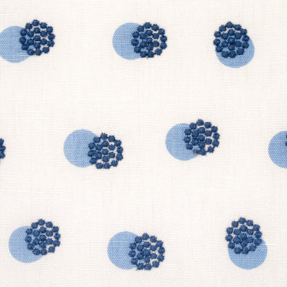 Cream fabric with repeating navy blueberry clusters and soft blue circle shadows.