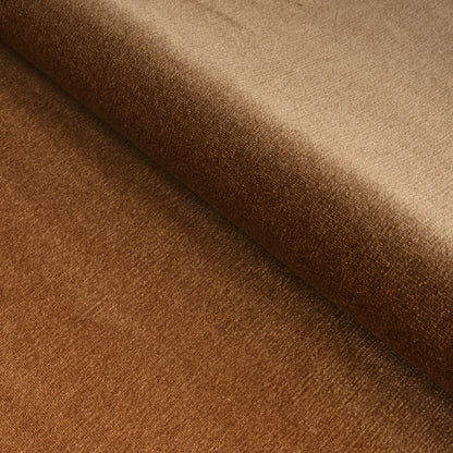 Close-up of warm brown wool fabric with a soft nap and a fold, versatile for clothing or upholstery.