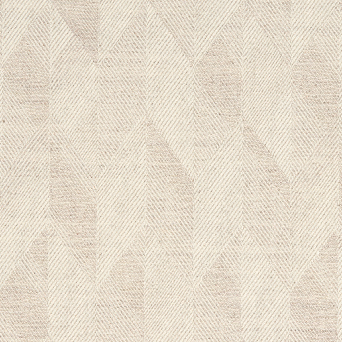 Beige woven rug with geometric chevron pattern in cream tones; modern, neutral home decor.