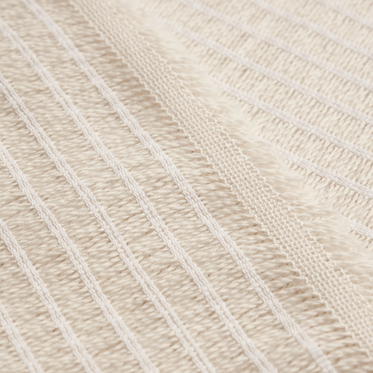 Beige striped woven fabric with raised ridges; natural linen-like texture.