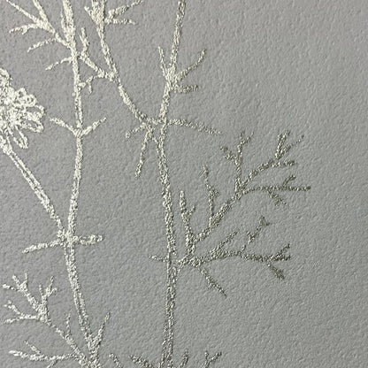Silver metallic botanical wallpaper — hand‑drawn sketch foliage motif, luminous finish, non‑woven paste‑the‑wall for easy installation and removal, ideal for accent walls in elegant interiors