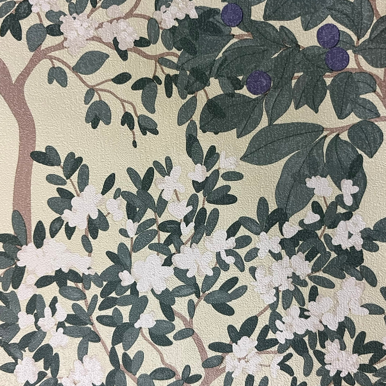 Close‑up of Veer Decor Arbor Serenade wallpaper in green and yellow – botanical tree and leaf pattern, non‑woven unpasted, matte finish, seamless alignment, perfect for accent walls in traditional or transitional interiors