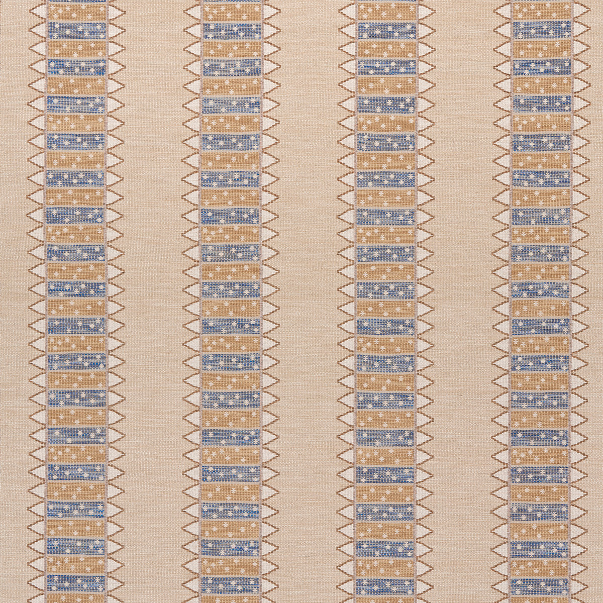 Beige woven textile with vertical stripes featuring brown zigzag borders and blue dotted tile‑like blocks.