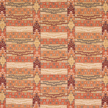 Kilim-style rug featuring warm orange, terracotta, cream, and tan geometric stripes with diamond motifs.