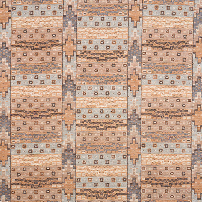 Earth-toned kilim rug with geometric tribal motifs in tan, peach, gray-blue and ivory.