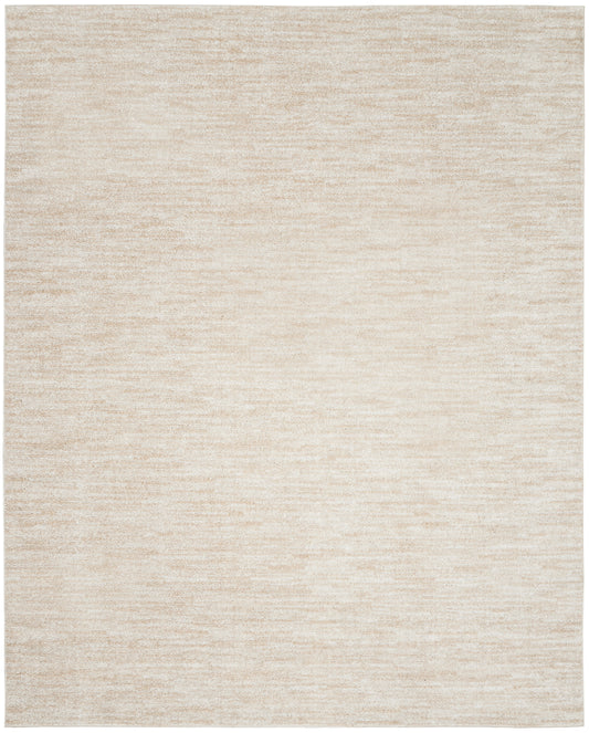 Beige textured outdoor area rug with subtle cream/tan variegation; rectangular, neutral rug for outdoor spaces.