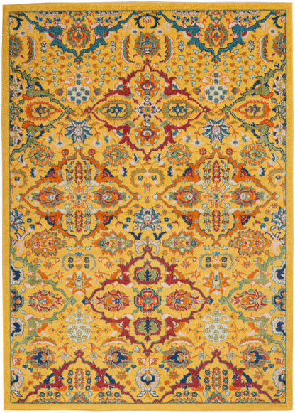 Rectangular oriental rug with a golden yellow field, vibrant floral medallions in red, teal, blue and green.