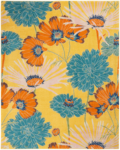 Yellow rug with bold teal chrysanthemums and orange blossoms in a bright tropical floral pattern.