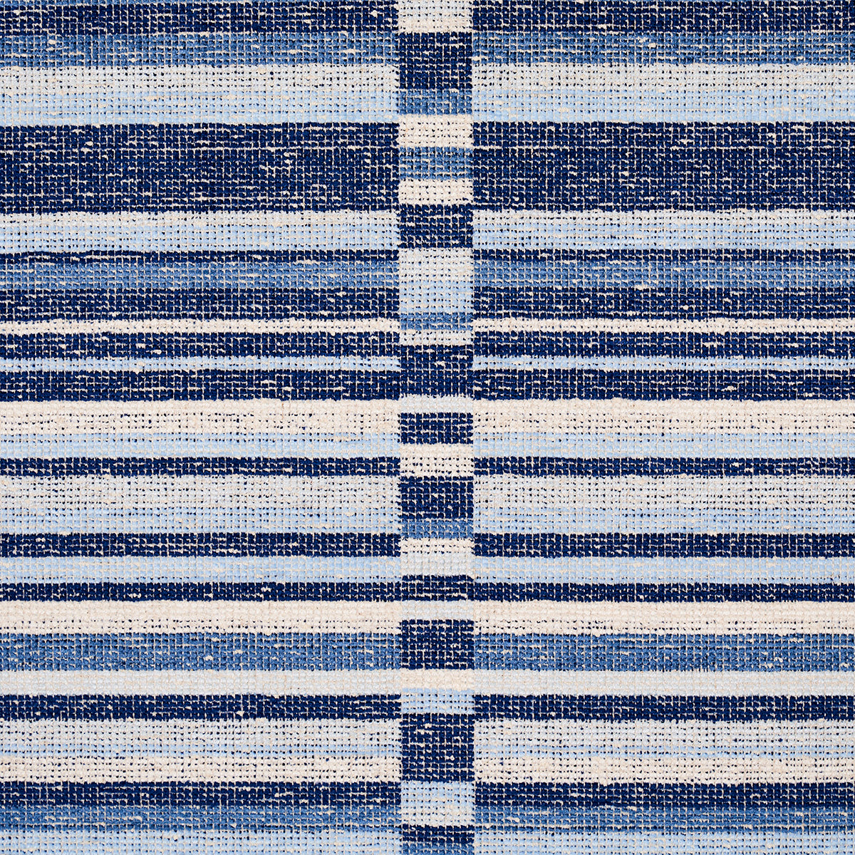 Woven blue and white striped textile with navy and light-blue bands; rectangular throw rug.