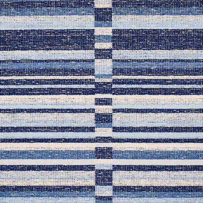 Woven blue and white striped textile with navy and light-blue bands; rectangular throw rug.