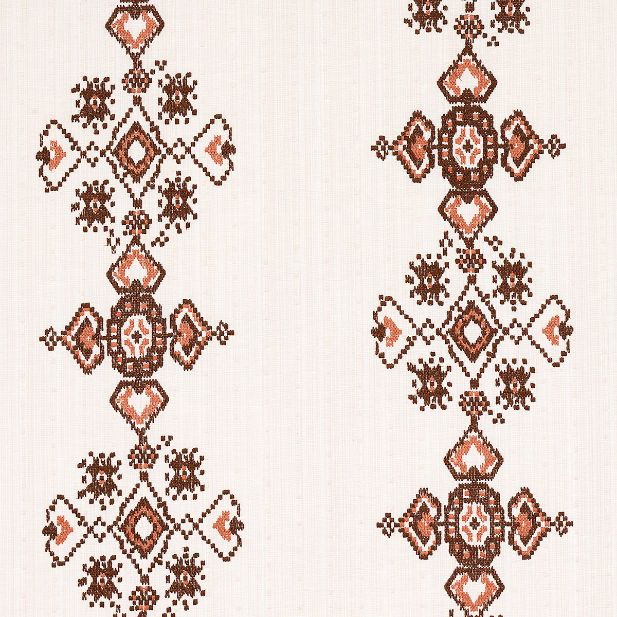 Cocoa colored embroidered fabric swatch with an intricate embroidery pattern.