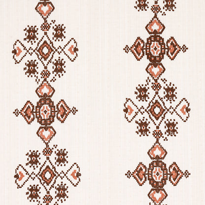 Cocoa colored embroidered fabric swatch with an intricate embroidery pattern.