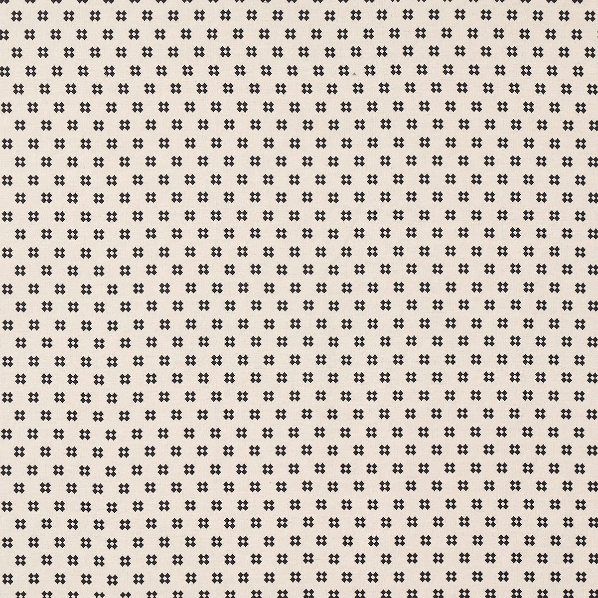 Cream fabric with a dense repeating pattern of small black flower-shaped motifs.