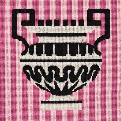 Knitted fabric with a black and white ornate urn motif on pink striped background.