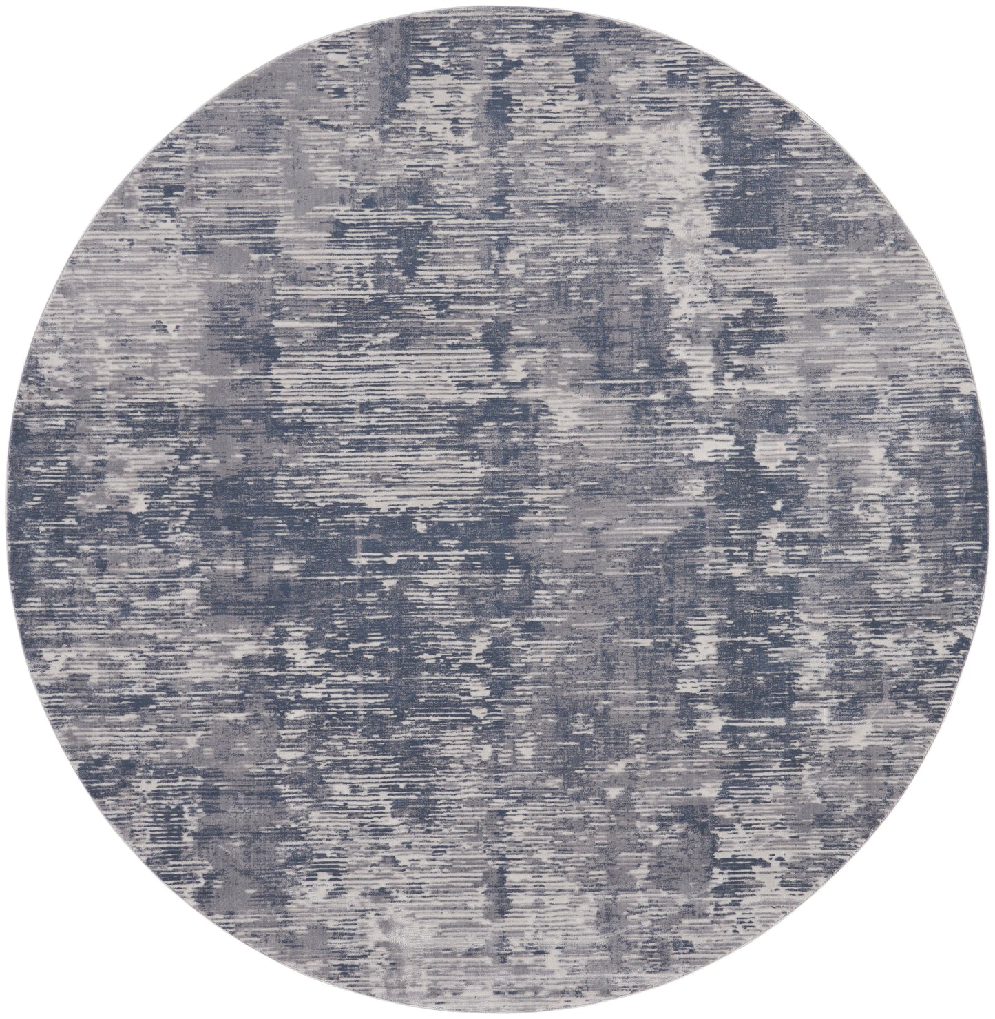 Round blue-gray rug with an abstract distressed pattern and plush texture for a modern living space.