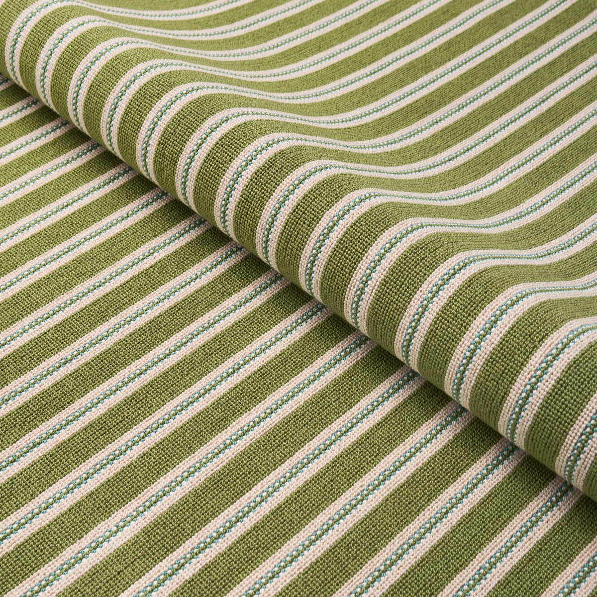 Woven olive-green fabric with white and light-blue stripes, textured, folded roll for upholstery or decor.