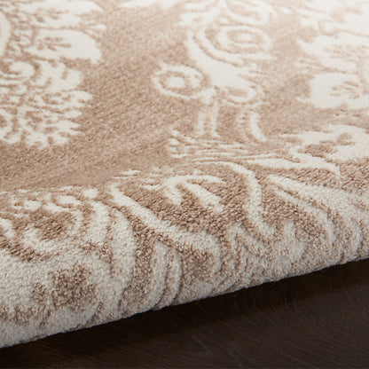 Beige plush runner rug with cream floral pattern and thick pile on dark wood floor.