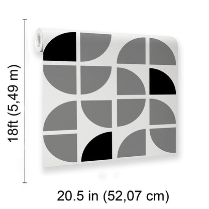 Geometric wall art panel with a 3x3 grid of black/gray quarter-circles on white; hanging hole on left edge; 20.5 in wide.
