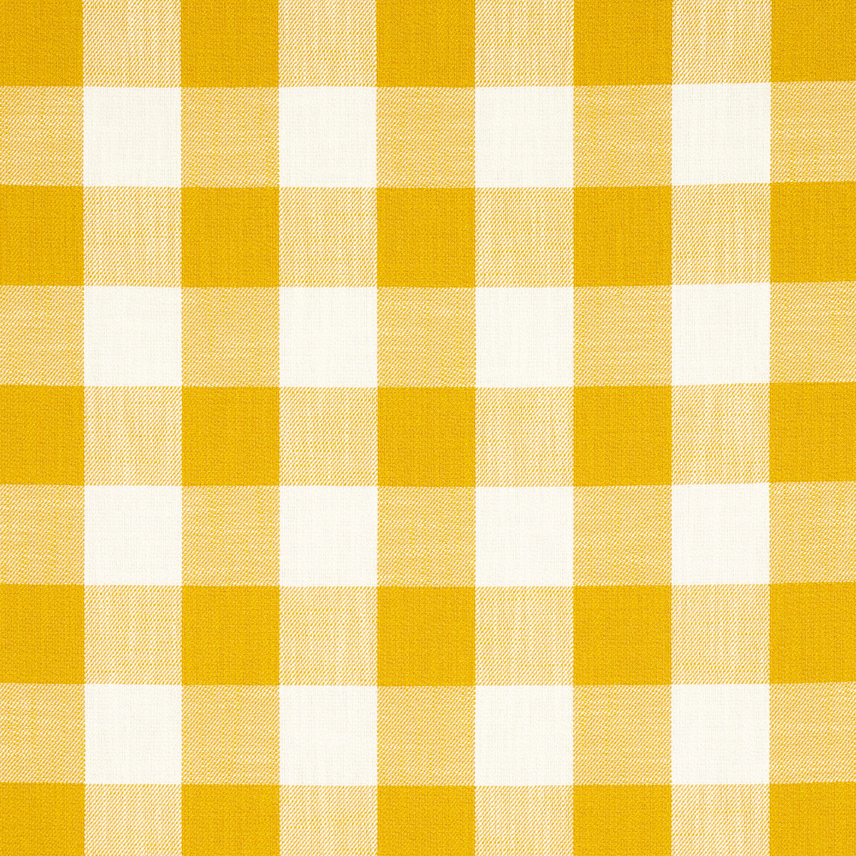 Yellow and white gingham check fabric, cotton textile with square pattern for tablecloths or apparel.