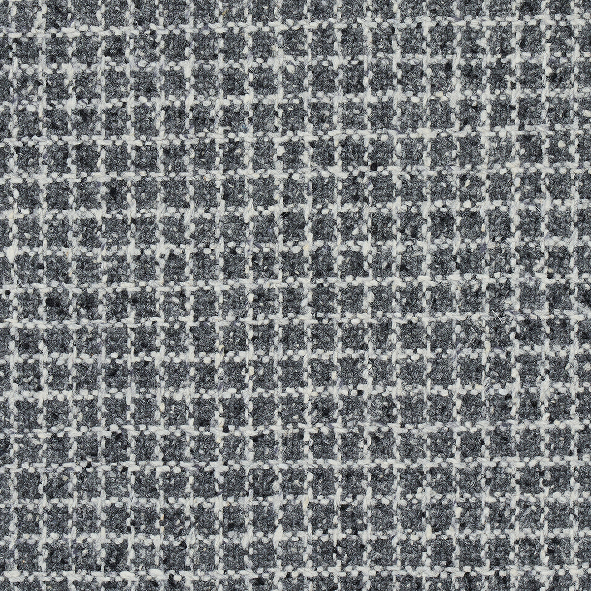 Close-up of grey tweed fabric with white check pattern; textured woven textile for jackets or upholstery.