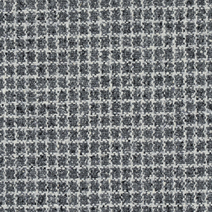Close-up of grey tweed fabric with white check pattern; textured woven textile for jackets or upholstery.