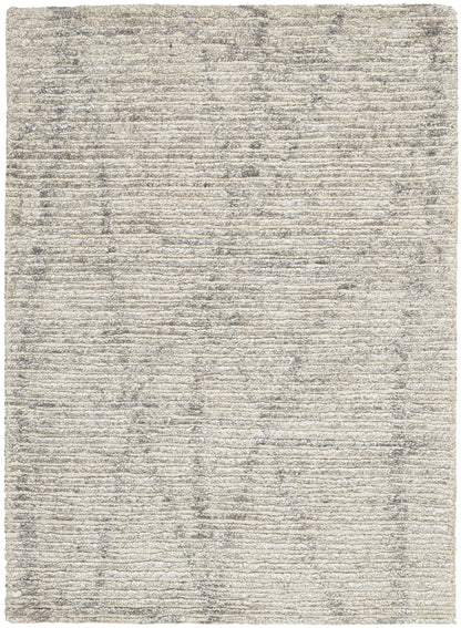 Light gray-beige area rug with subtle horizontal striped texture and distressed finish.