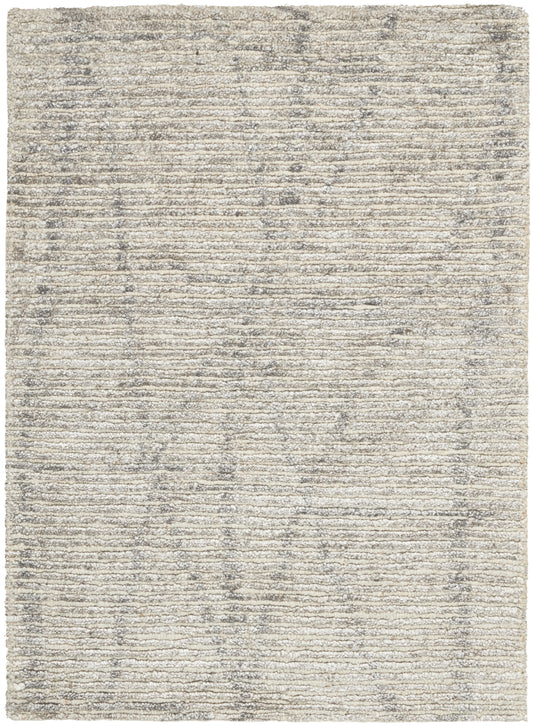 Light gray-beige area rug with subtle horizontal striped texture and distressed finish.