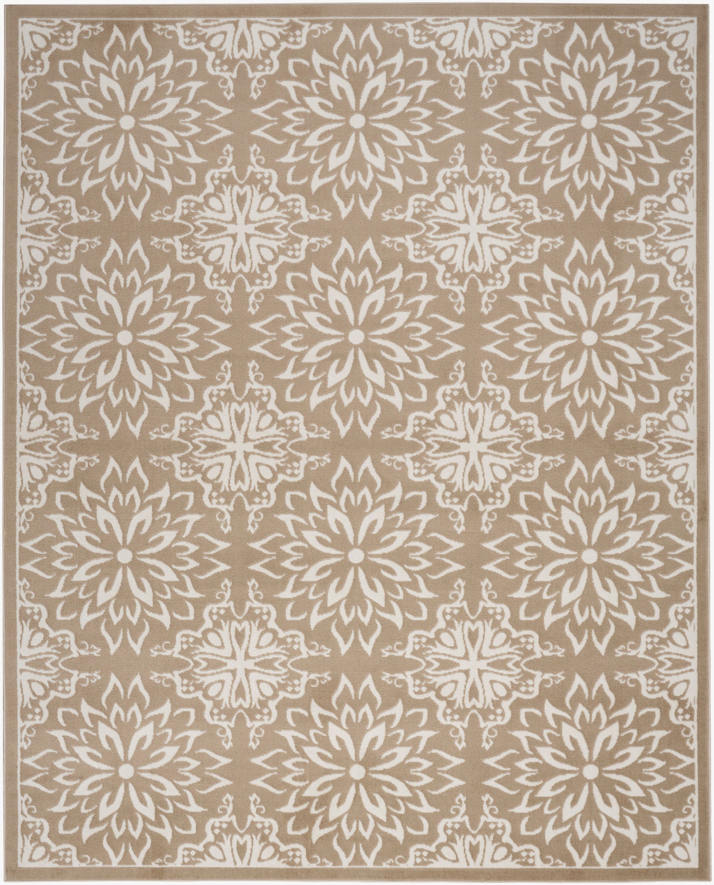 Beige area rug with white ornate sunburst floral medallions in a repeating border pattern.