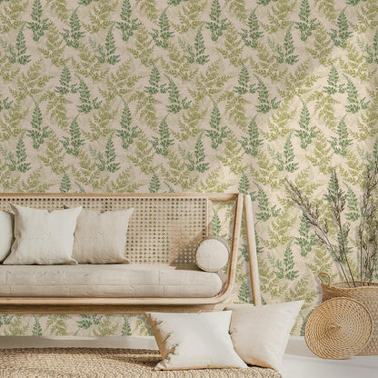 Neutral living room with green watercress herb wallpaper, a rattan sofa with cream cushions, and a woven basket planter.