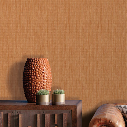 Veer Decor Rafia Grasscloth Mango Wallpaper showing woven raffia texture in warm mango orange hues, ideal for tropical, coastal, or organic modern interiors.