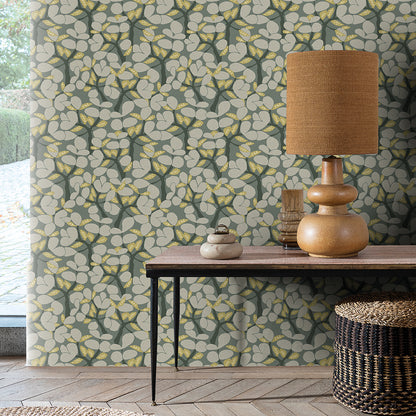 Sage green leaf-pattern wallpaper with a botanical design.