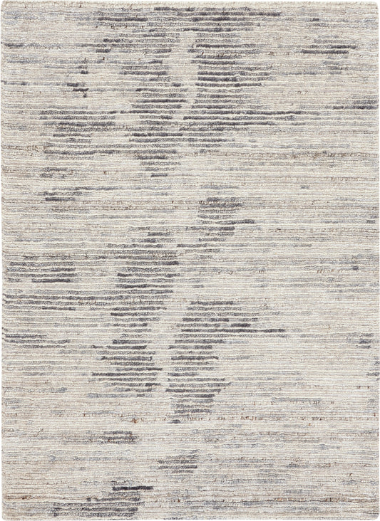 Neutral beige area rug with subtle gray abstract pattern and soft textured pile for modern living rooms.