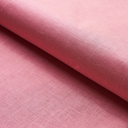 Soft pink linen-like fabric, folded edge, fine weave texture; great for garments or home decor.