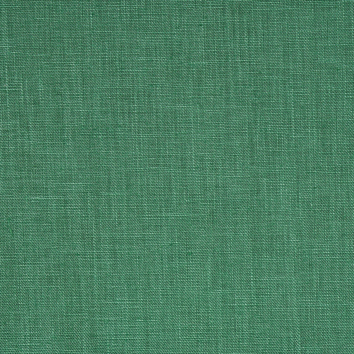 Close-up of green woven fabric texture with visible threads, textile background.